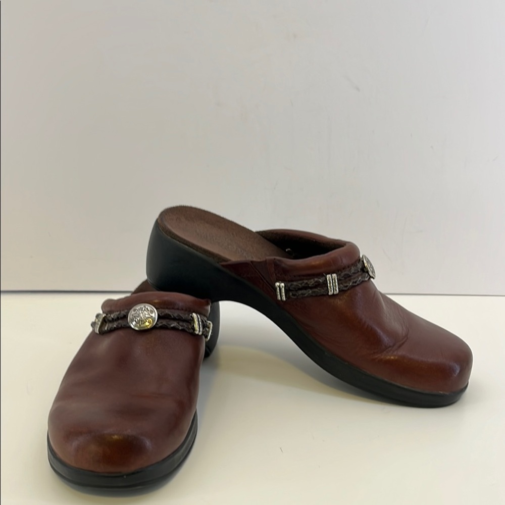 Minnetonka Brown Leather Mules with Braided Detail